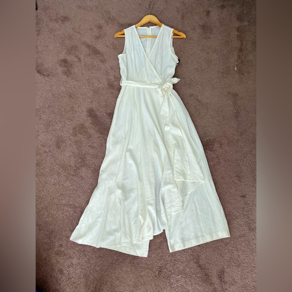 NWT. Calvin Klein white skirt jumpsuit. Size 8